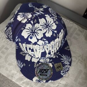 “New York” Text Fitted Boys Hat.
Floral Design. Strap Back. Custom Size. W&B.